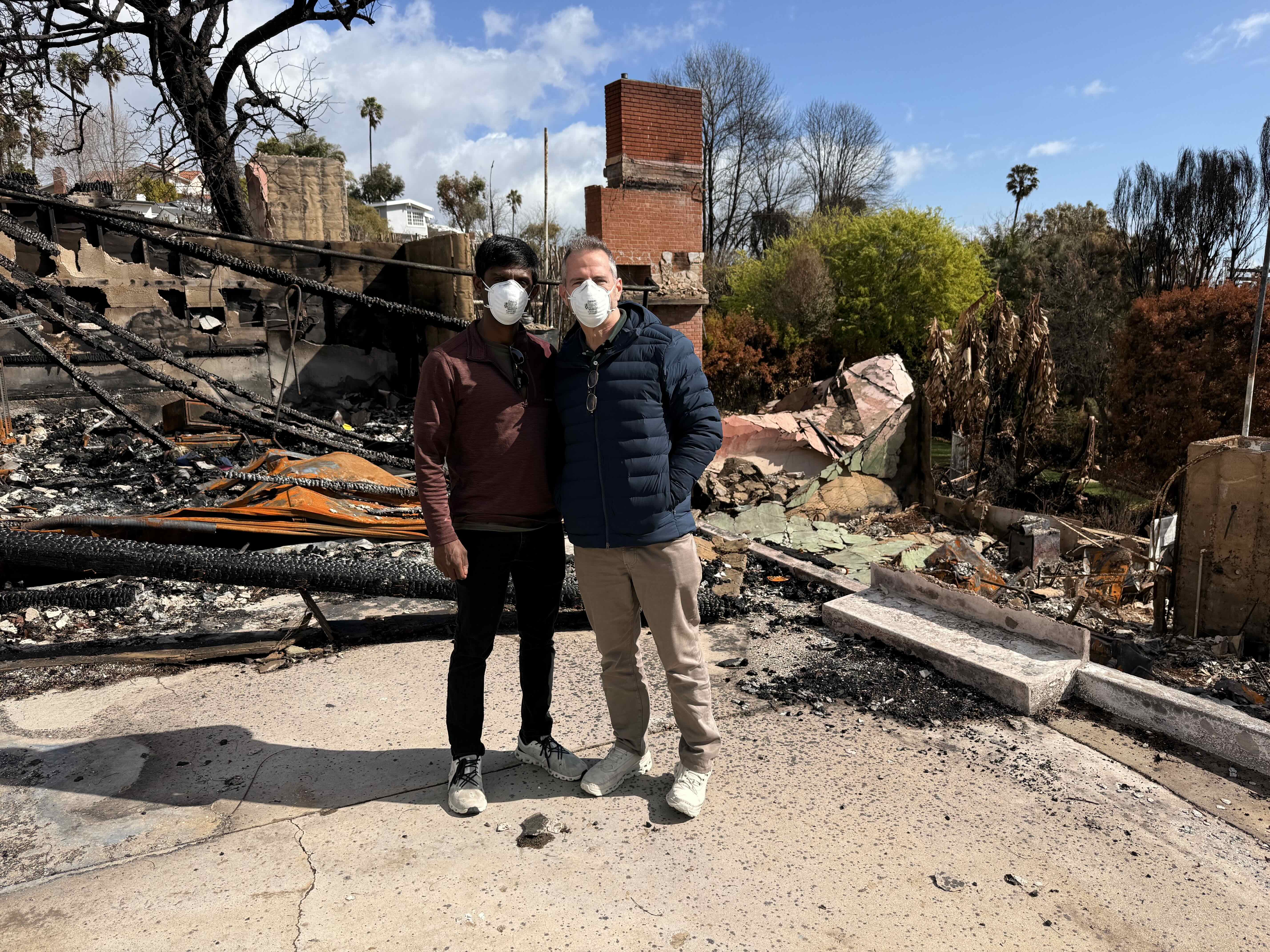 Aravindh and Adam at what remains of Adam's family home in Pacific Palisades